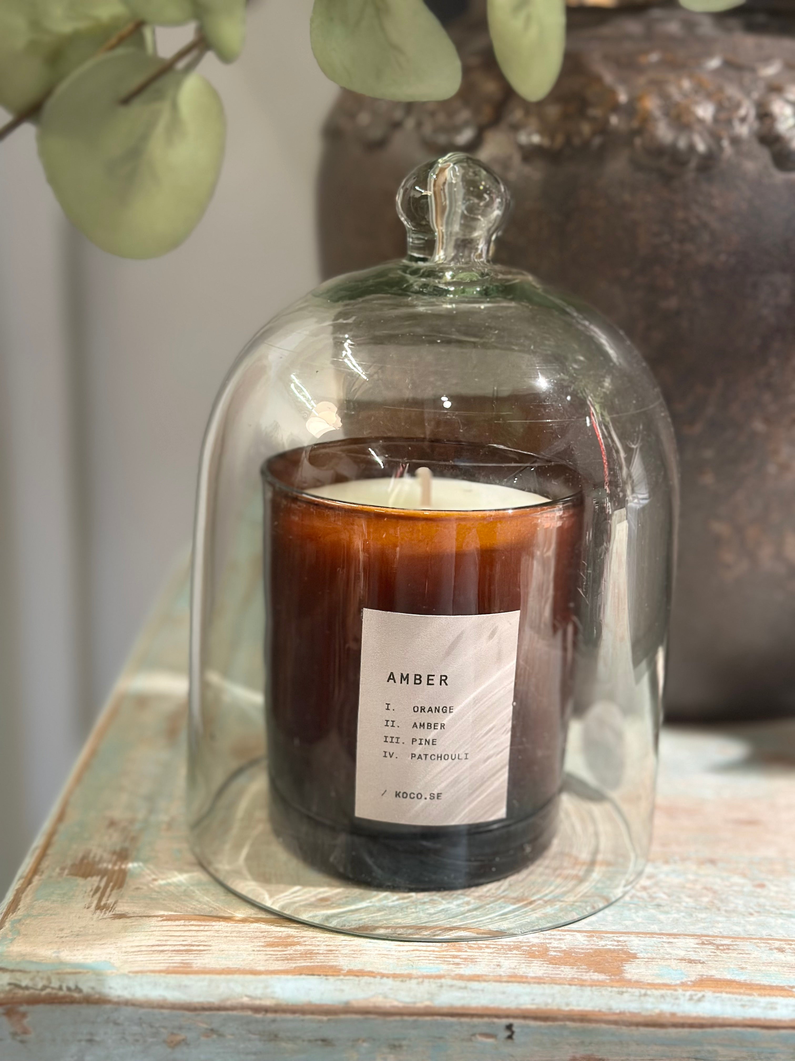 duftlys i glasklokke