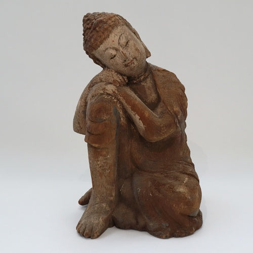 buddha med venstre knæ