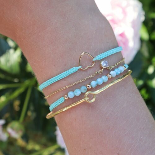 flere armbånd sammen turkis guld
