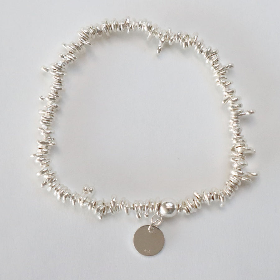 sølvarmbånd af ringe