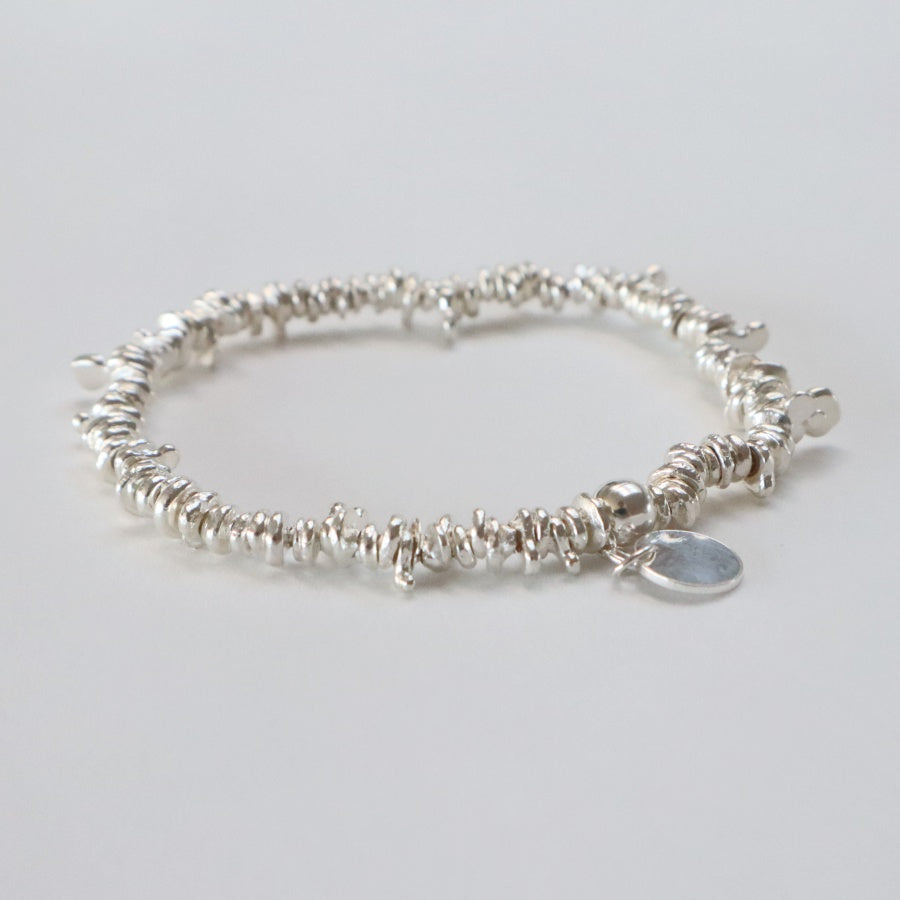 sølvarmbånd af ringe