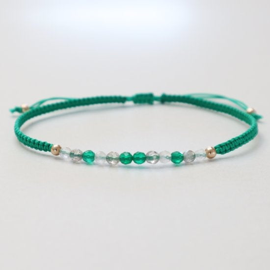 smaragd armbånd med guld